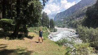 Rainbow Tai Chi & Chi Kung with Robin and Liza practicing Tai Chi near river
