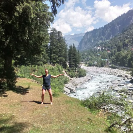 Rainbow Tai Chi & Chi Kung with Robin and Liza practicing Tai Chi near river